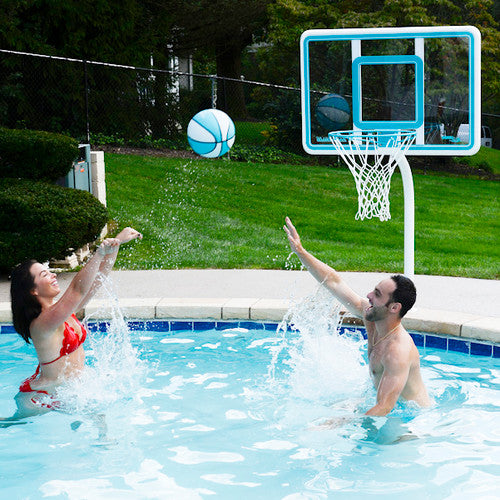 Man and woman playing pool basketball with the Deck Shoot hoop system, highlighting durable backboard and splash-proof fun