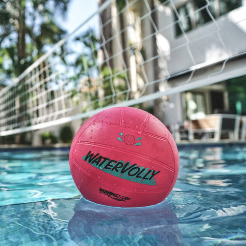 Close-up of Watervolley pool volleyball with net and modern backyard in background