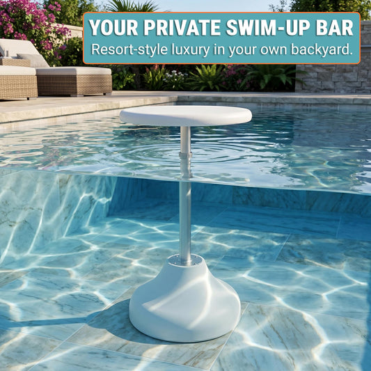 White outdoor pool bar table in a pool with garden and stone wall in the background