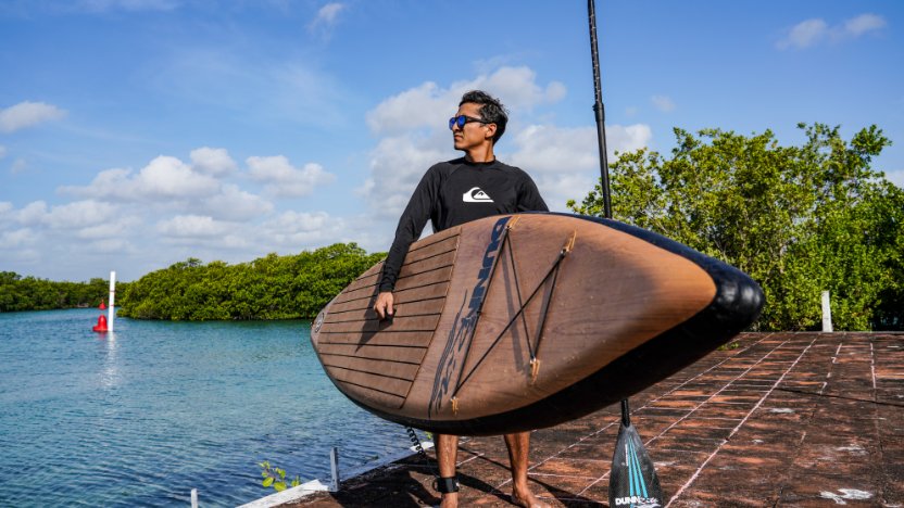 natural wood inflatable paddleboard - dock