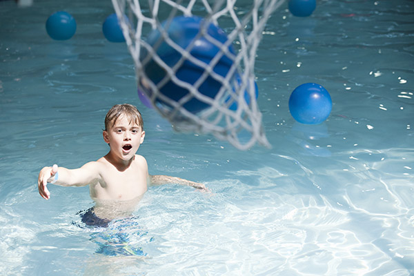 Child Playing Solo Pool Basketball