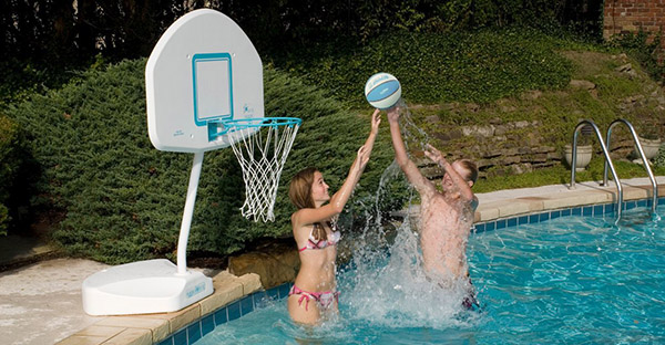 Boy and Girl Playing Pool Basketball